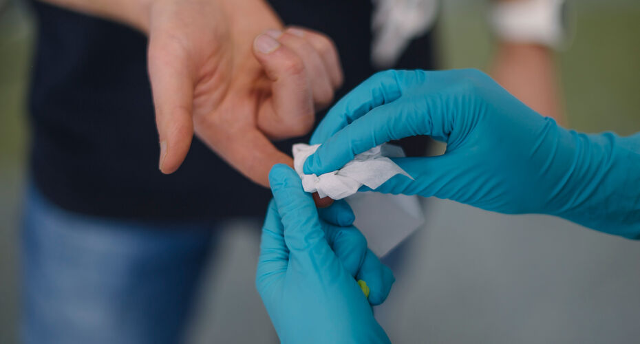 Medical student taking blood