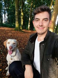 Photo of steven dean morrill with his dog.