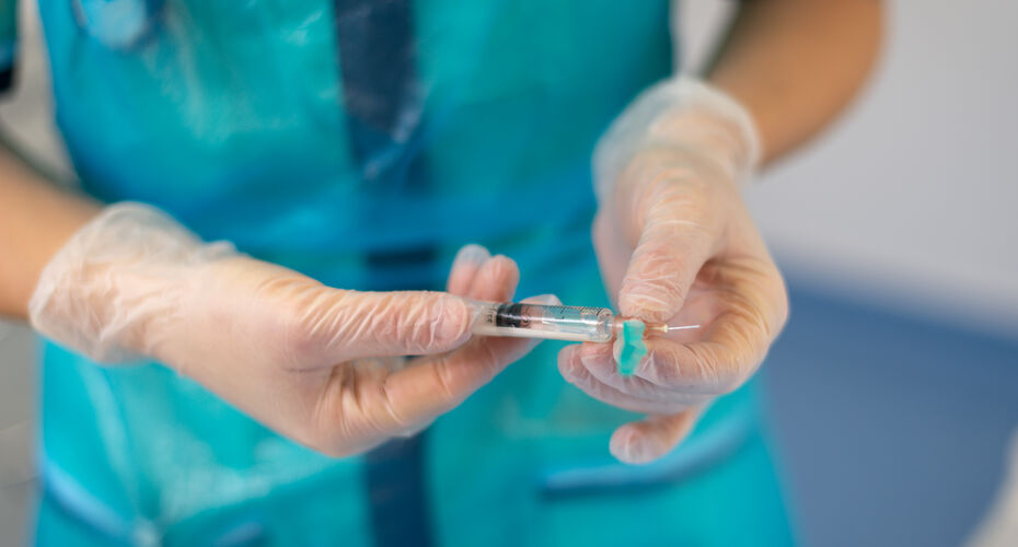 A student nurse prepares a practice injection in the Clinical Skills Research Centre