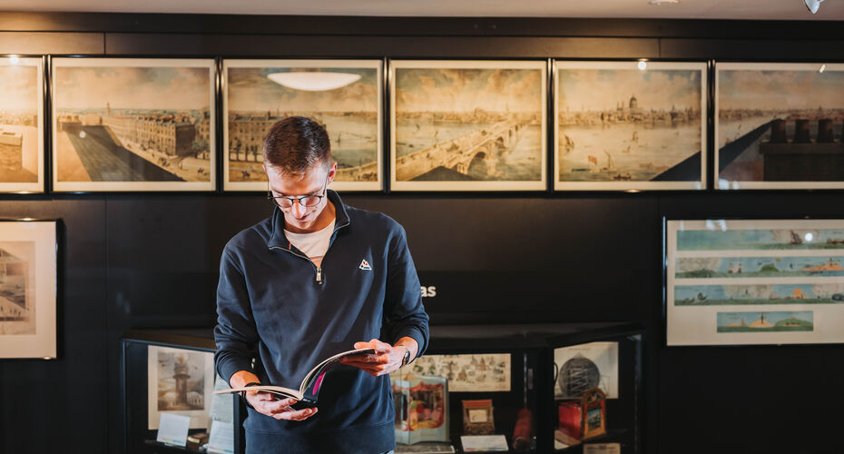 A student looking at resources in the Bill Douglas Centre