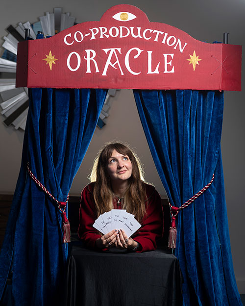 Lady in a puppet theatre