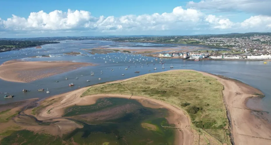 An aerial photo showing the approach to the Exe Estuary from the sea.